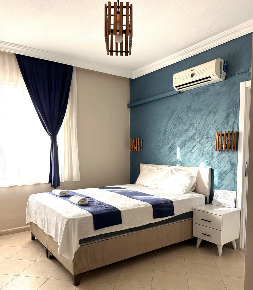Bed, Bedroom, towels, air conditioner