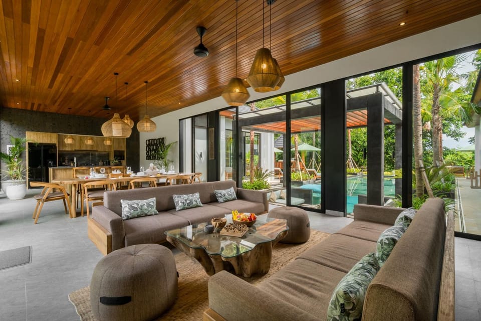 Living room, Seating area, Garden view, Pool view