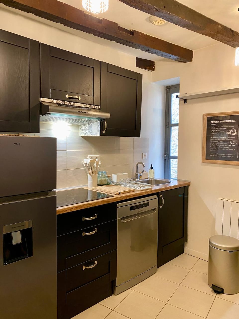 Kitchen or kitchenette, dishwasher, oven, stove
