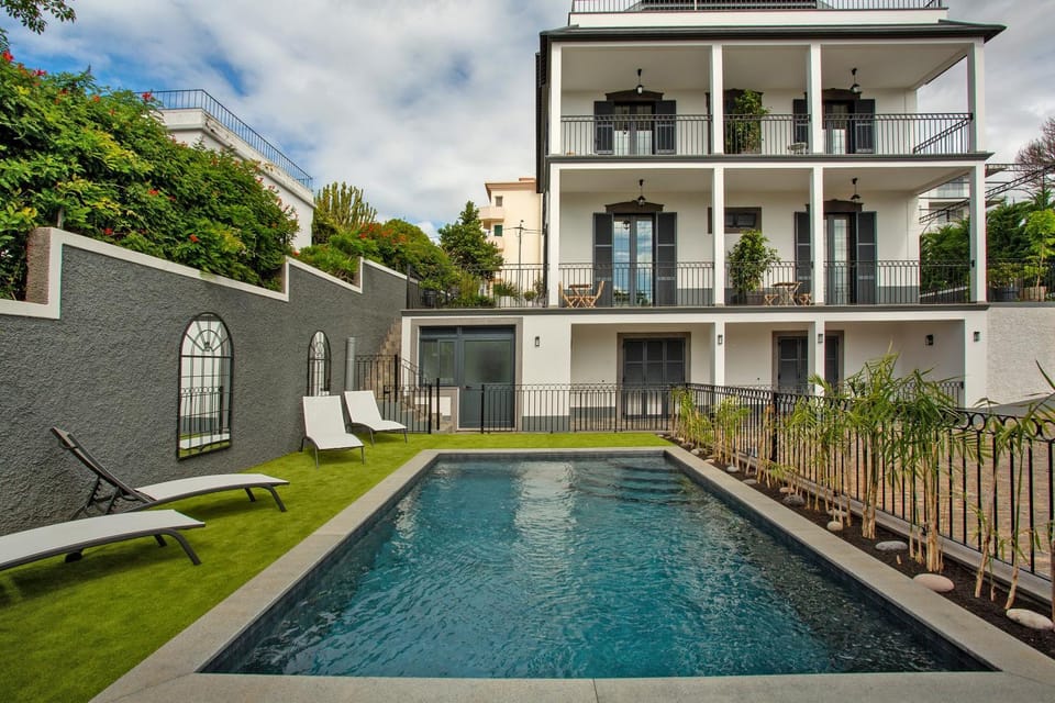 Property building, Living room, Swimming pool