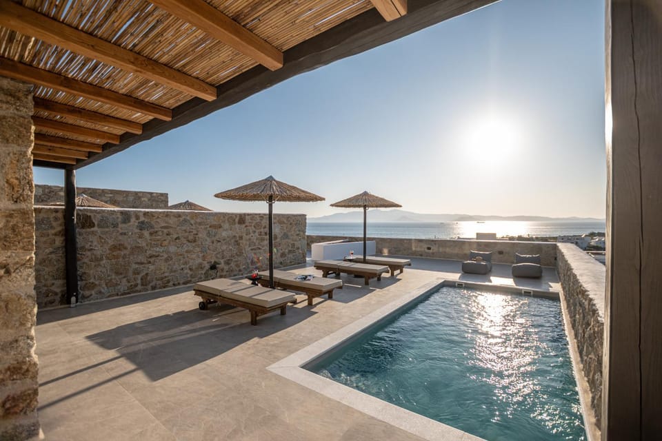 Property building, Patio, Nearby landmark, Spring, Day, Night, People, People, People, Natural landscape, Summer, Other, Other, Other, Seating area, Autumn, Text overlay, Text overlay, Text overlay, Guests, Guests, Guests, Pool view, Pool view, Sea view, Sea view, Swimming pool, Swimming pool, Swimming pool, Seasons, Time of day, Location, Sunrise, Sunset, children, children, children, young children, young children, older children, older children, group of guests, group of guests, group of guests, sunbed, sunbed, VIP