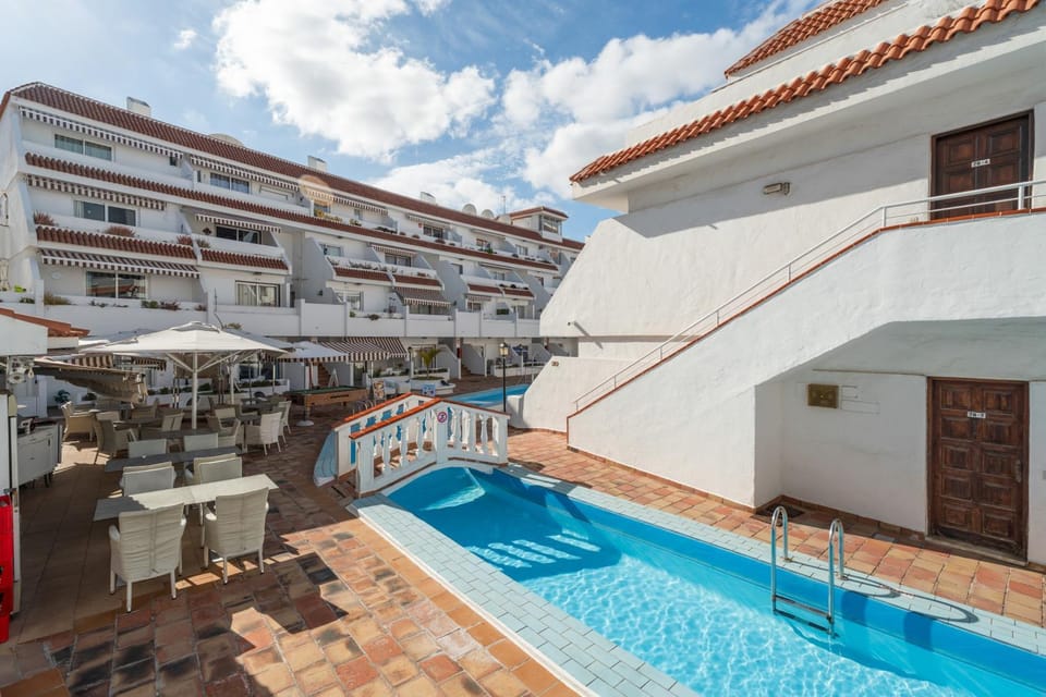 Property building, Living room, Swimming pool