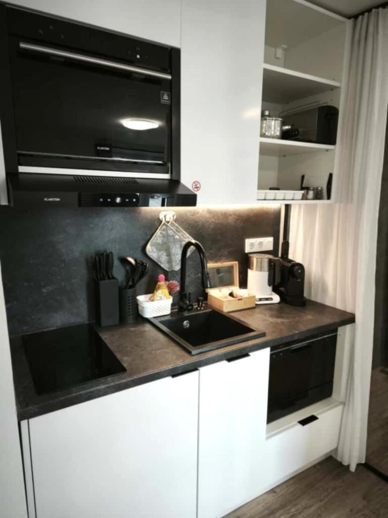 Kitchen or kitchenette, stove