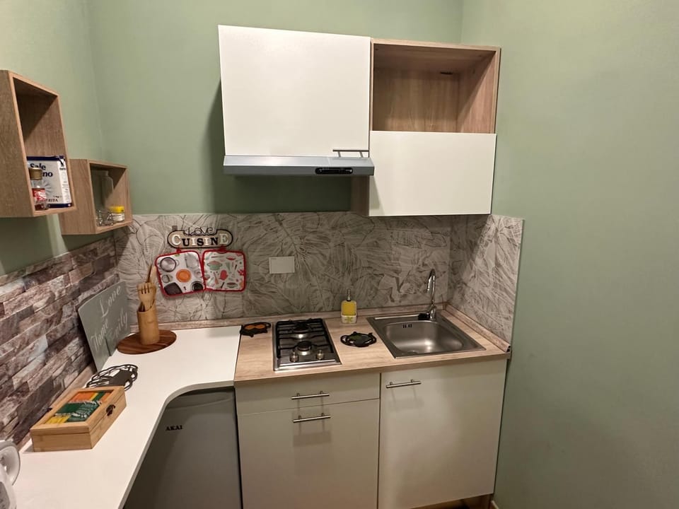 Kitchen or kitchenette, stove