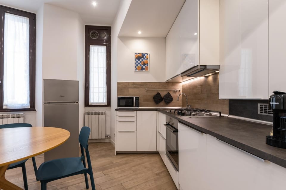 Kitchen or kitchenette, Dining area, dishwasher, microwave, oven, stove