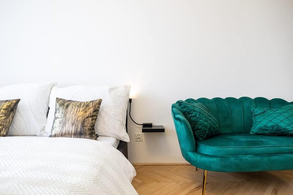Bed, Living room, Seating area, Bedroom