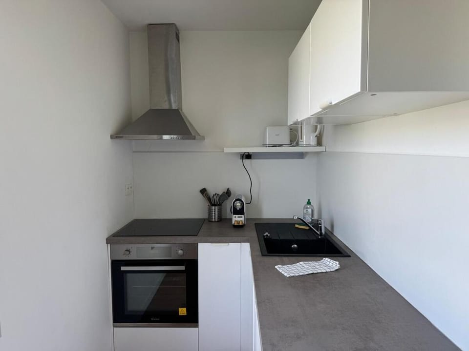 Kitchen or kitchenette, stove