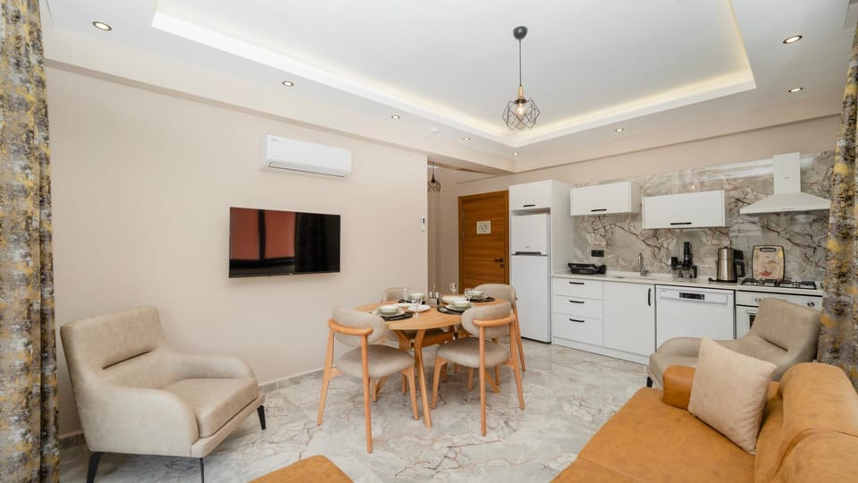 TV and multimedia, Kitchen or kitchenette, Living room, Seating area, Dining area, dishwasher, oven, stove, air conditioner