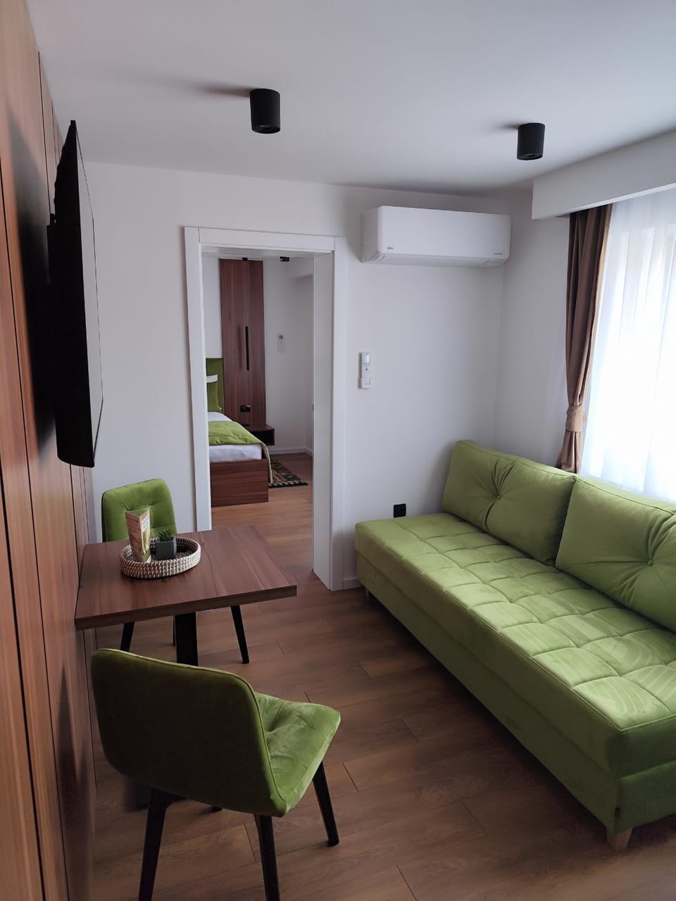 TV and multimedia, Living room, Seating area, air conditioner