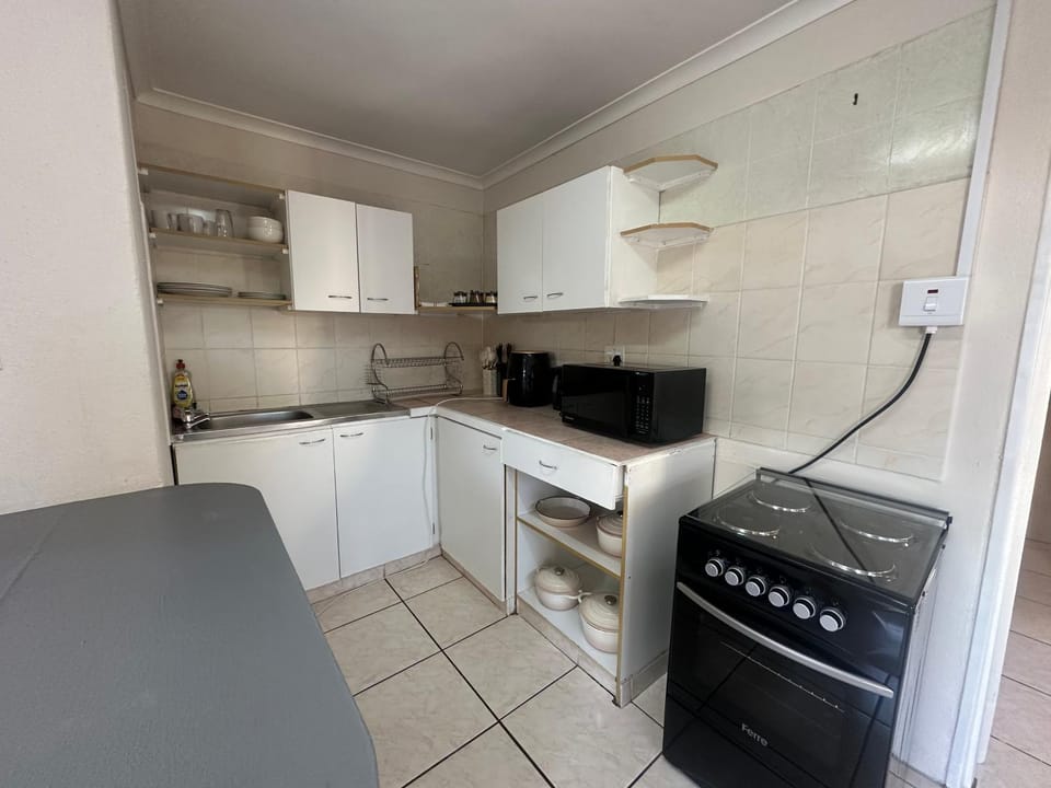 Kitchen or kitchenette, oven, stove, toaster