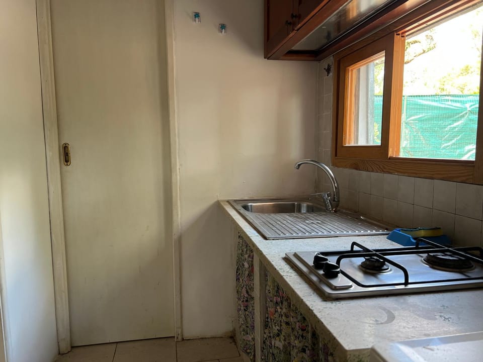 Kitchen or kitchenette, stove
