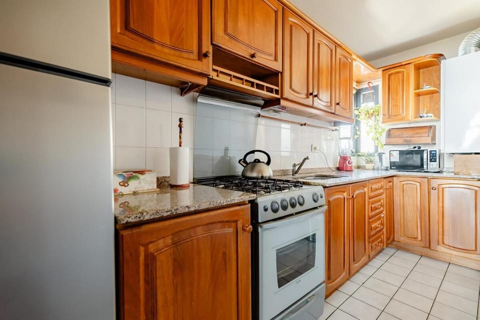 Kitchen or kitchenette, oven, stove