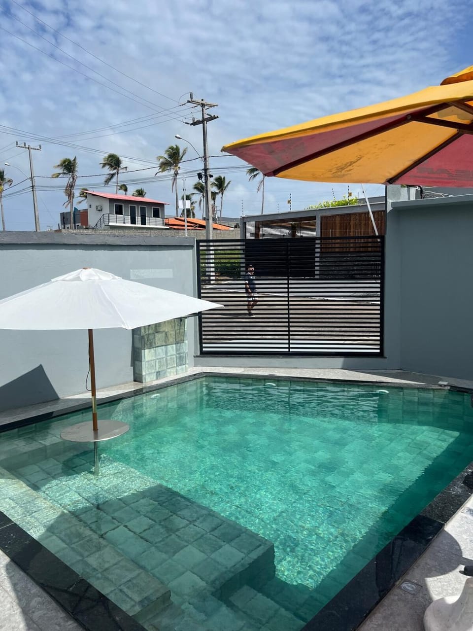 Property building, Day, Pool view, Swimming pool, sunbed