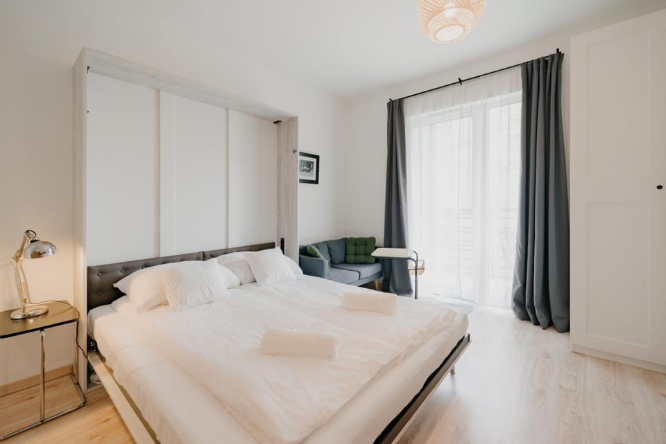 Bed, Seating area, wardrobe