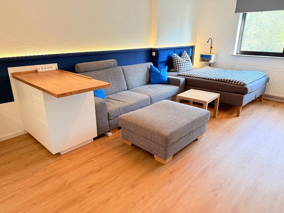 Bed, Living room, Seating area, Bedroom