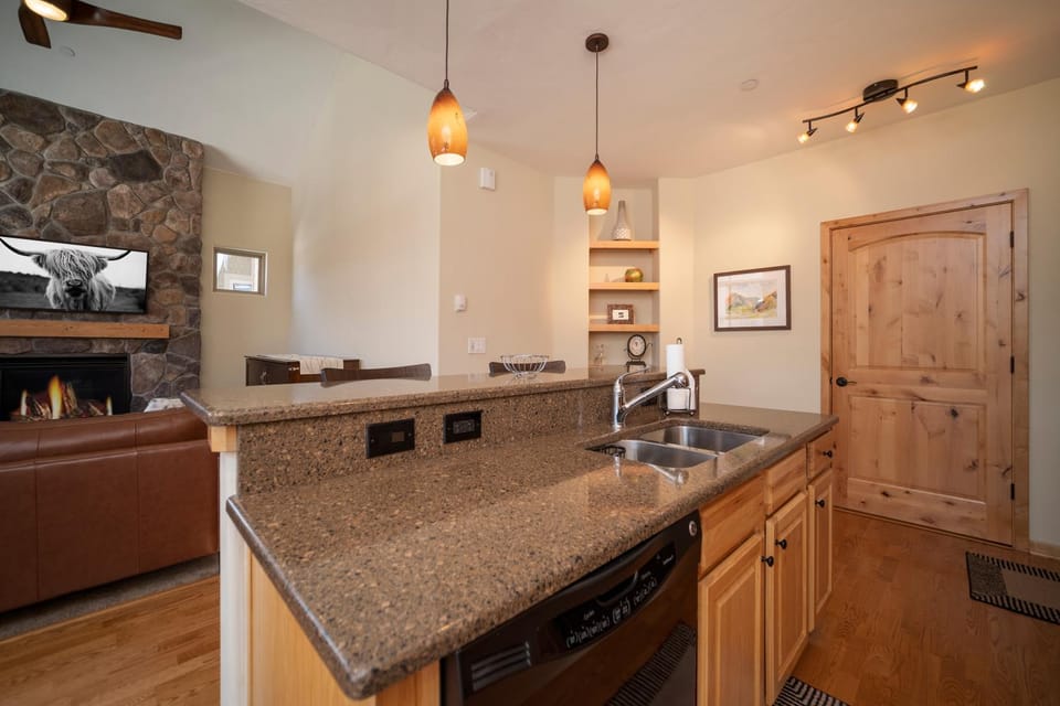 Kitchen or kitchenette, Living room, dishwasher, fireplace, furniture, kitchen