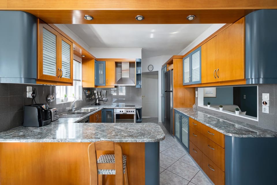 Kitchen or kitchenette, dishwasher, oven, stove