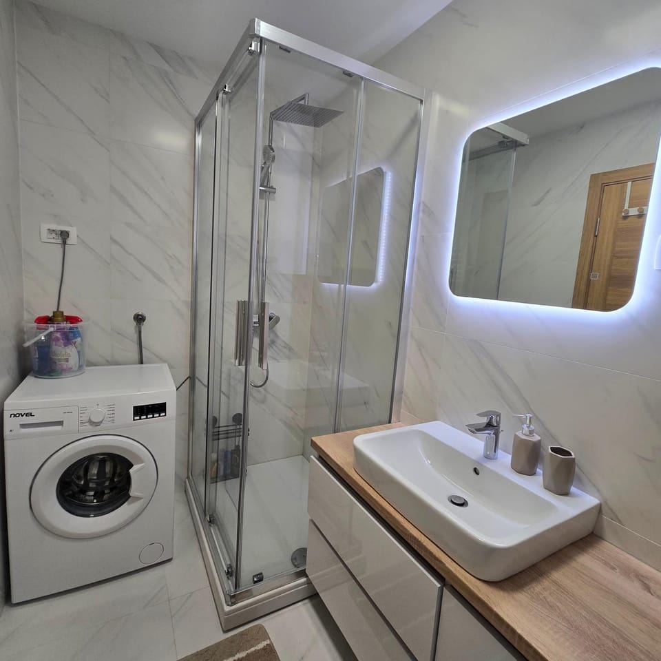 Shower, Bathroom, towels, washing machine, dryer