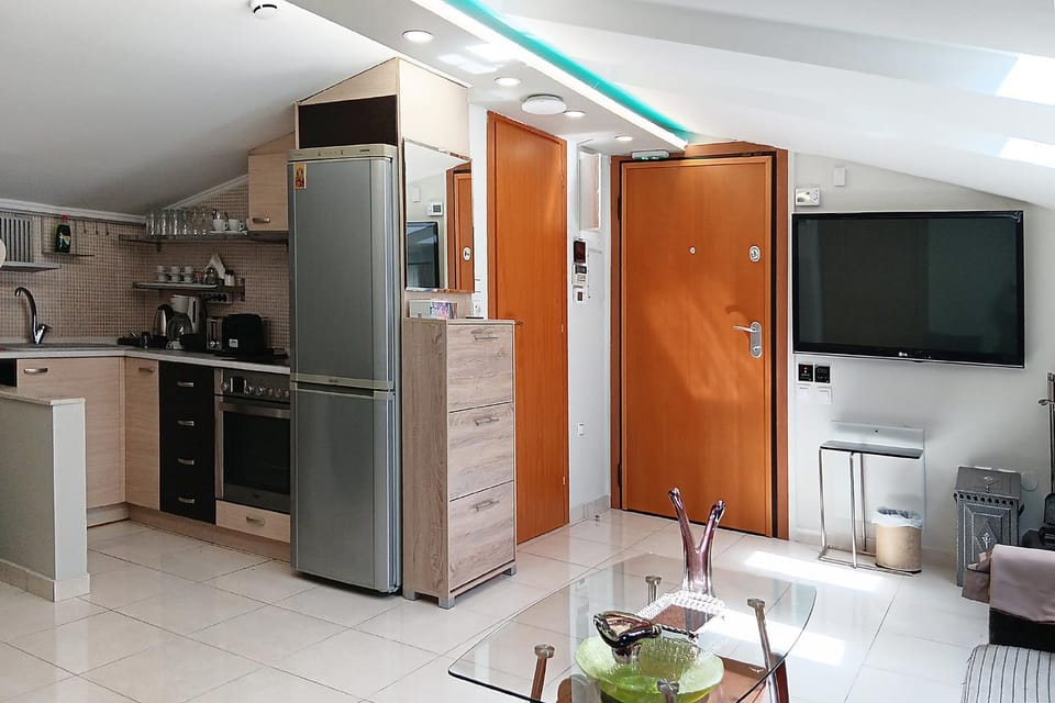 Kitchen or kitchenette, dishwasher, oven, stove