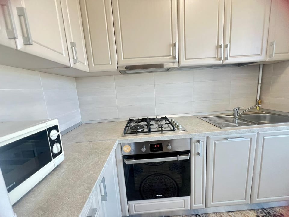 Kitchen or kitchenette, stove