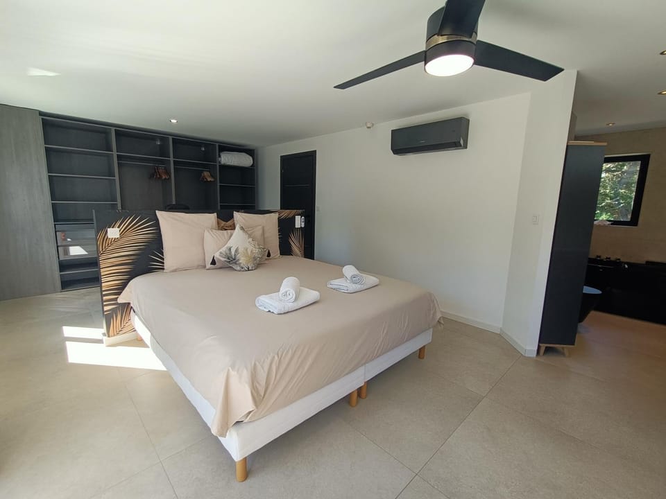 Bed, Photo of the whole room, Bedroom, towels, air conditioner