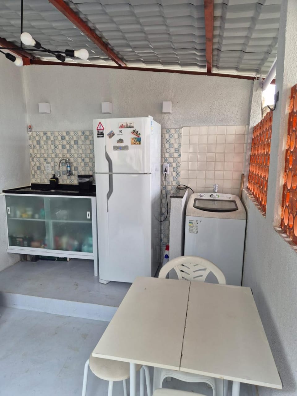 Kitchen or kitchenette, washing machine