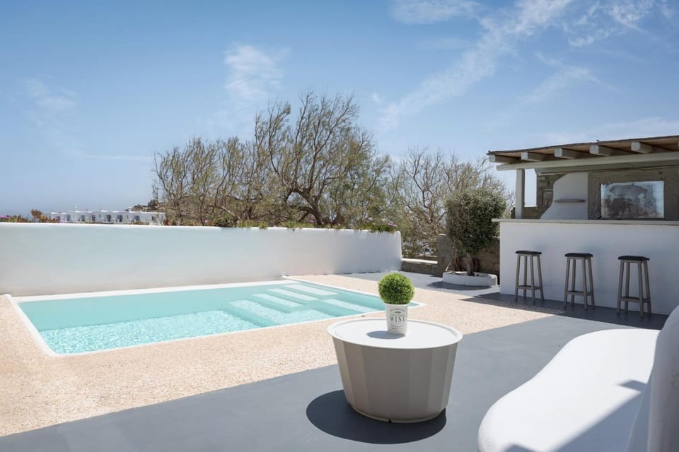 Property building, Patio, Day, Natural landscape, View (from property/room), Balcony/Terrace, Pool view, Swimming pool