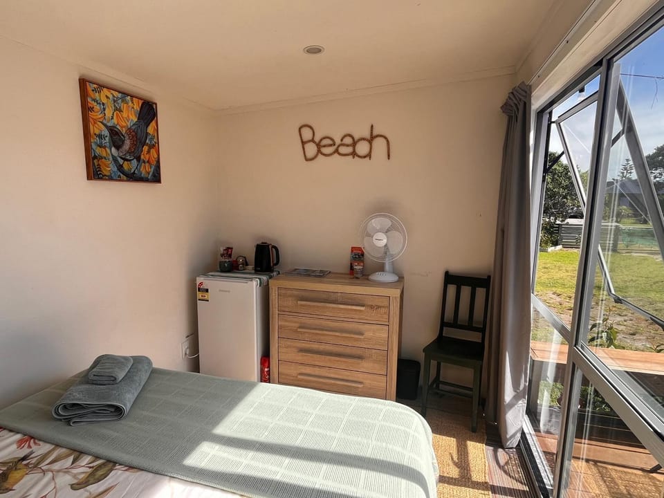 Sunsets on Harbour Kauri or Totara Cabin Cabin in Auckland Region