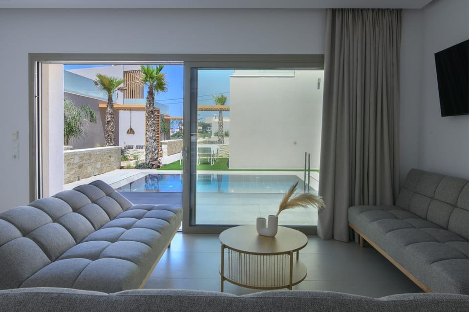 Living room, Seating area, Pool view