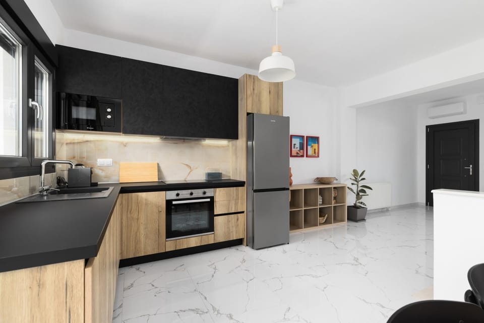 Kitchen or kitchenette, dishwasher, oven, stove
