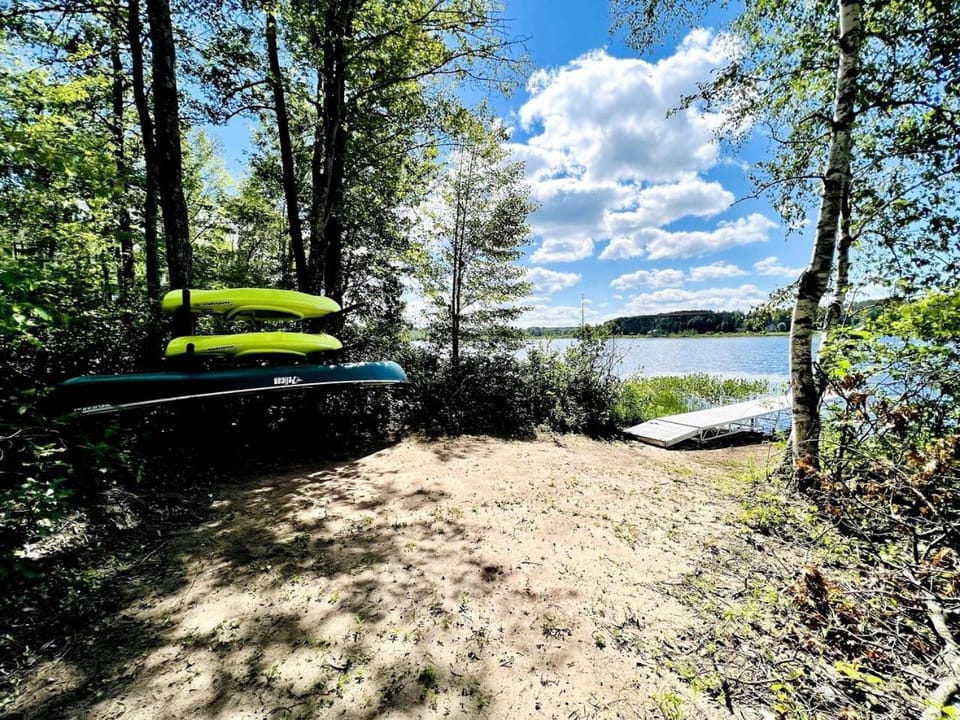 Group Lake Cabin with Ping Pong Table Loaded with Kayaks in Wisconsin Cabin in Wisconsin