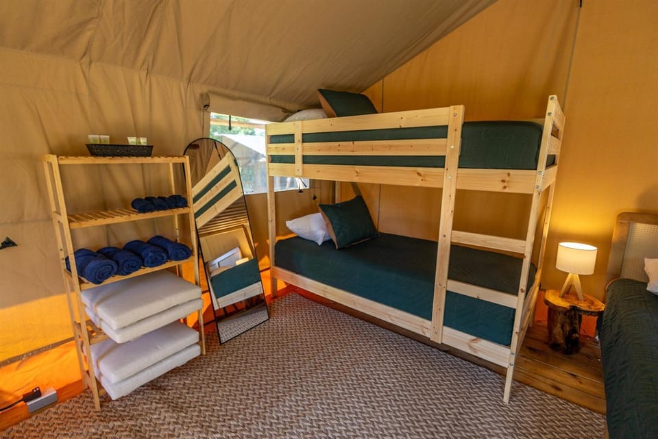 A Calm and Cozy Lakeside Glamping Retreat Awaits Luxury tent in Lake Livingston