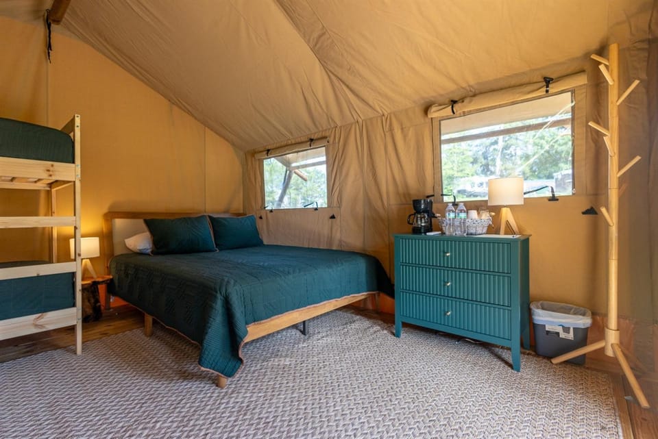 A Calm and Cozy Lakeside Glamping Retreat Awaits Luxury tent in Lake Livingston