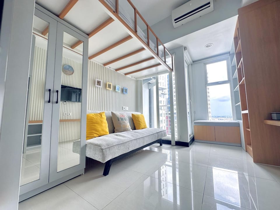 Bed, TV and multimedia, View (from property/room), Photo of the whole room, Seating area, bunk bed, wardrobe, air conditioner