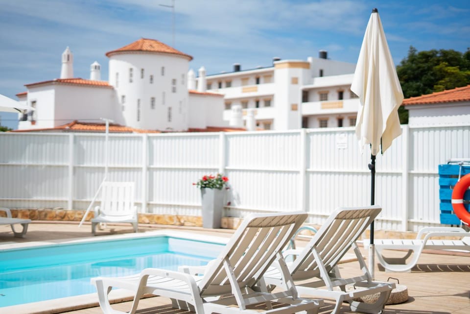 Swimming pool, sunbed