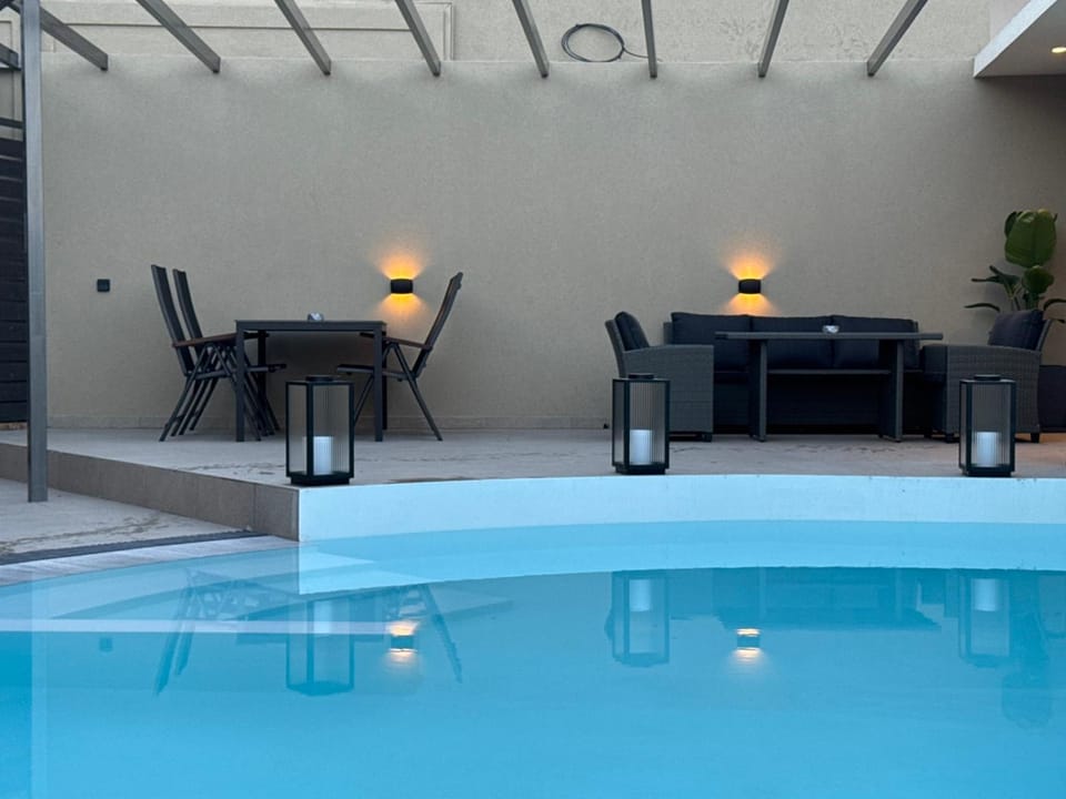 Patio, Living room, Seating area, Pool view, Swimming pool, Swimming pool, sunbed