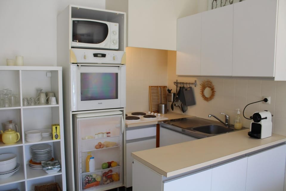 Kitchen or kitchenette, stove