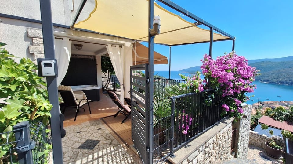 Studio Apartment Đuli Rabac with private hot tub, bike box and free parking Apartment in Istria County