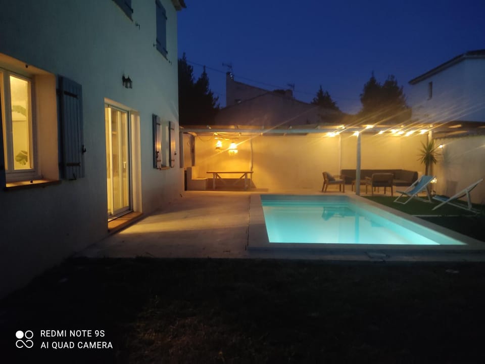 Patio, Night, Pool view, Swimming pool, sunbed
