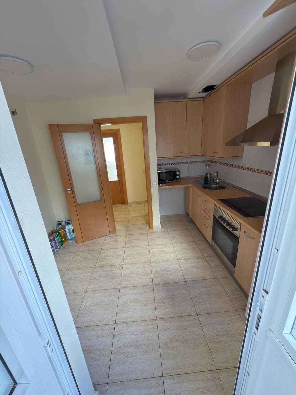 Kitchen or kitchenette, oven, stove