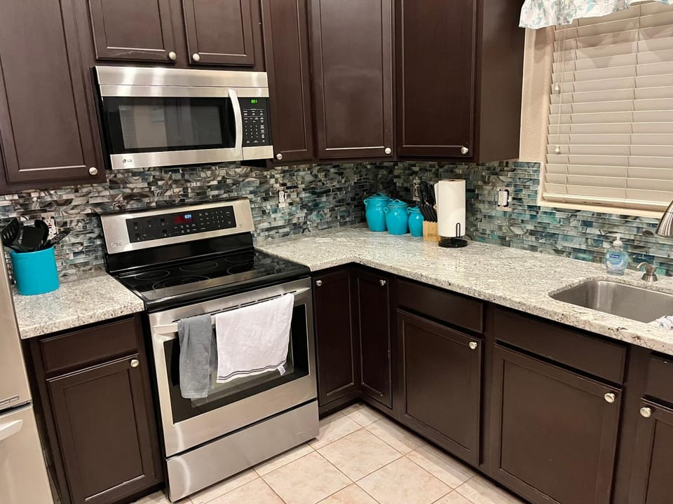Kitchen or kitchenette, stove