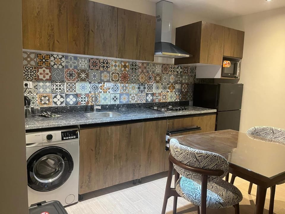 Kitchen or kitchenette, dishwasher, minibar, washing machine