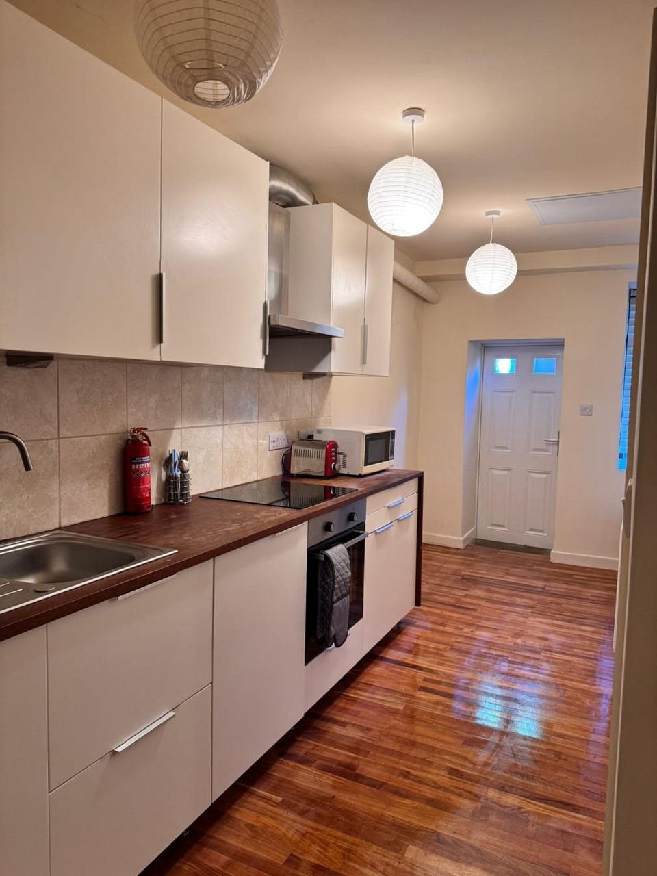 Kitchen or kitchenette, oven, stove, toaster