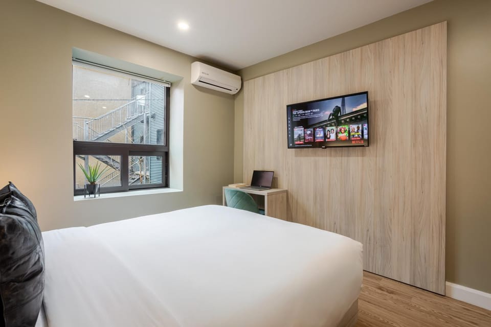 Bed, towels, air conditioner, air conditioner
