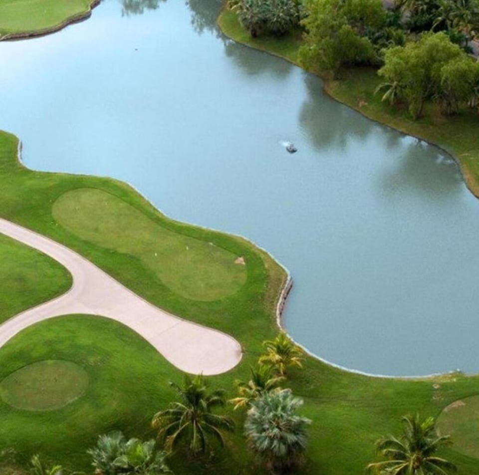 Magnificent Canal House with Dock and Adjacent Golf Villa in Nuevo Vallarta