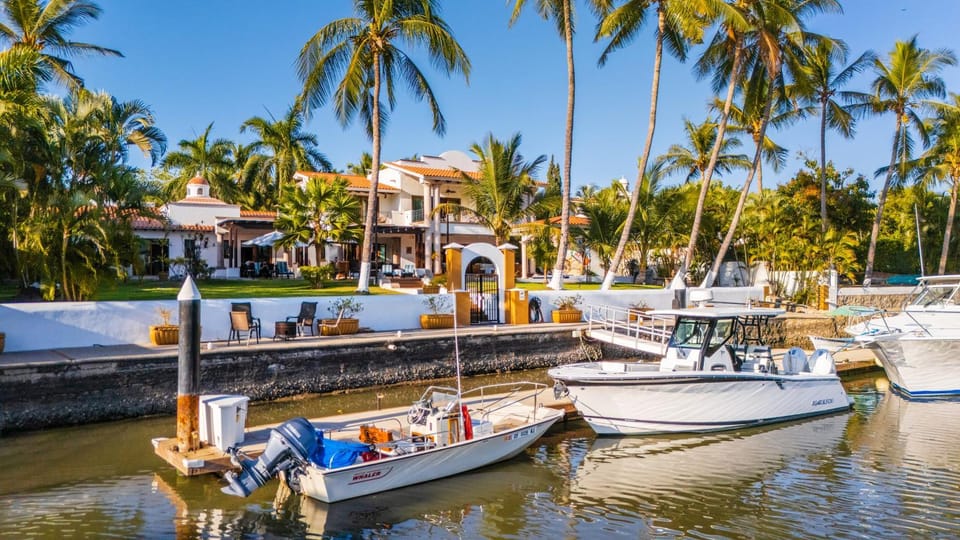 Magnificent Canal House with Dock and Adjacent Golf Villa in Nuevo Vallarta