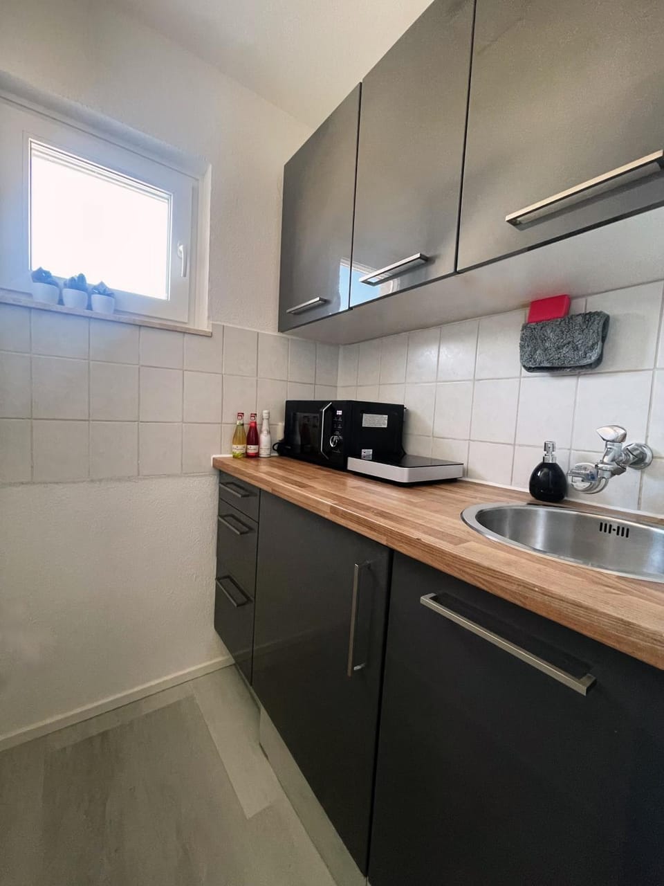 Kitchen or kitchenette, microwave
