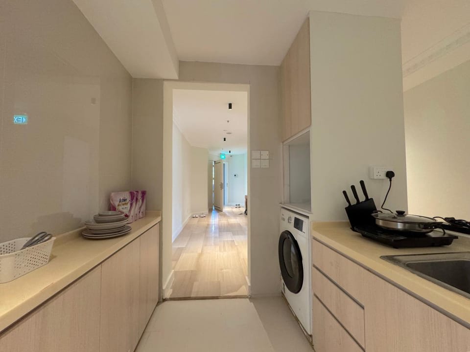 Kitchen or kitchenette, washing machine