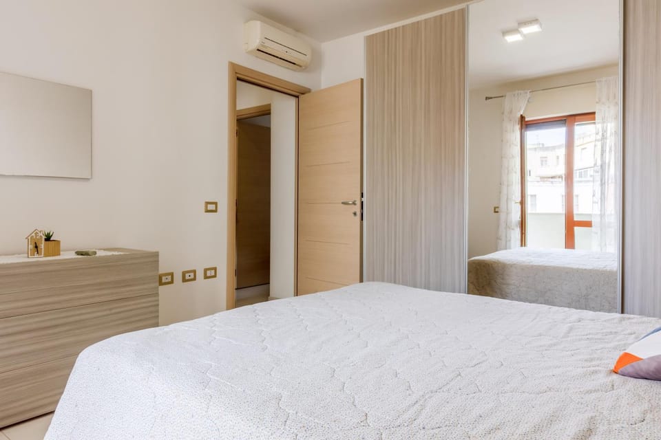 Bed, Bedroom, towels, wardrobe, air conditioner