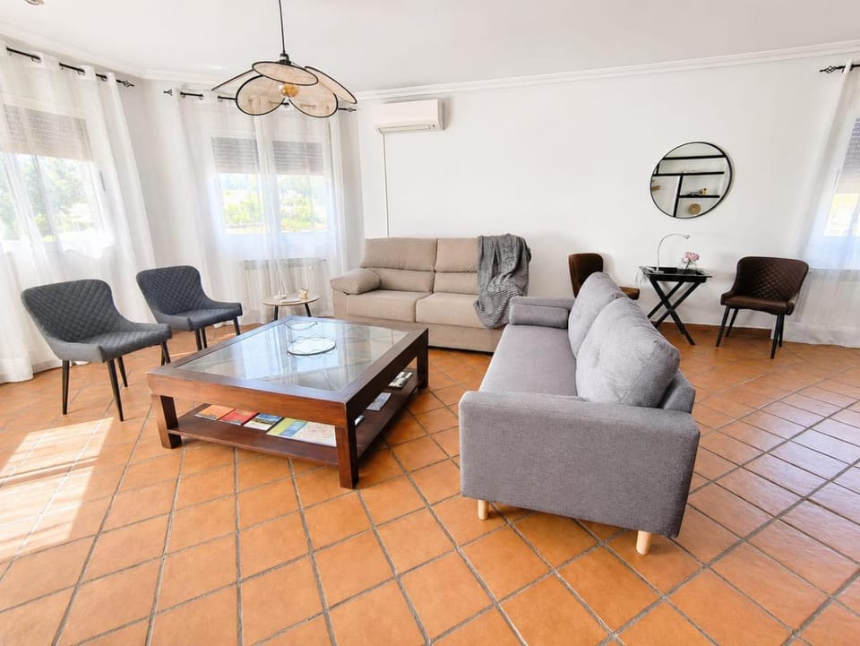Communal lounge/ TV room, Seating area, Dining area, air conditioner